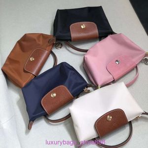 Designer -Bag -Läden sind 95% Rabatt auf französisches Brötchen Mini Knödel Handheld Zero Wallet Classic Style können mit Schultergurt -Kreuzbody gepaart werden, ohne zu schlagen7rlq