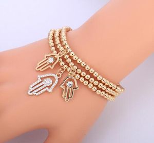 Gold Evil Eye Armband Turkish CZ Crystal Small Charm Hand of Hamsa Armband för kvinnor Elastic Chain Fashion Bead smycken gåvor3213388