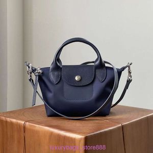 Designer Bag -butiker är 95% rabatt på en förtjockad version Nylon Handbag Crossbody Dumpling pendling Vattentät enkel axel Toteus7U