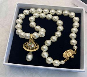 Empress Dowager Xi Pearl Necklace Kvinnlig design Threedimensional Saturn UFO Pendant Temperament Elegant ClaVicle Chain år 20227867143