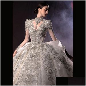 Свадебные платья A-Line 2024 Арабские длинные рукава с бисером жемчужины кристаллы Sequined Satin Bridal Howns Роскошные Дубай Империя Империя Бальные платья Princ Otbtf