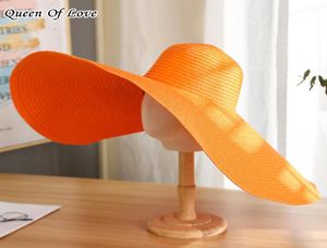 Szerokie brzegowe czapki 12 colors panie letnie ponadprzeciętne 70 cm kobiety Foppy Big Beach Hat Fashion Solne wakacje Słońce Caps Drop3884157