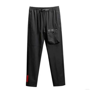 Homem calças casuais Joggers Sports TRUSH BOLDS BOIDADERY BURSO POACHET POACHETSTRING AJUSTO OUTRA