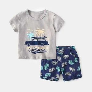 Shorts Brand Design 2024 Sommar Nya babykläder pojkar spårkläder barn t-shirt+shorts 2-stycke uppsättning av barns tecknad uppsättning baby pojkar kläder d240510