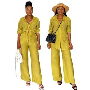 黄色の二枚セットパンツ服の女性カジュアルラペルネックシャツとワイドレッグパンツセット無料船