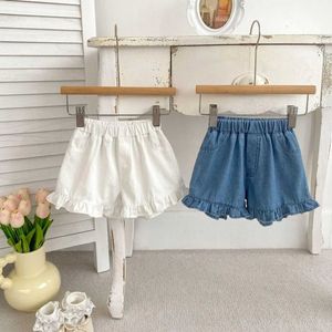 Shorts New Summer Girls Baby Solid Soft Denim Shorts Newborn Baby Thin Ruffled Jeans Childrens Cotton Casual Shorts Childrens Medium Density Fiberboard d240510