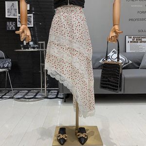 Saias Retro da moda da moda RETRIMENTO RELA Irregular Patchwork com padrões florais de cintura alta e elegante Saia para mulheres