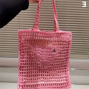 High quality Designer Woven Bag Fashion P family pure handmade woven fishing net bag beach photo tourism paper rope handbag ins style hollowed out Handbag for women