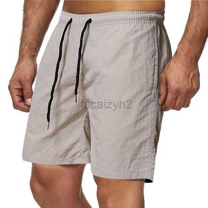 Mäns plus -storlek Shorts Sommaren Mäns Casual Shorts Candy Color Capris Men's Ten Color Waterproof Torking Beach Pants