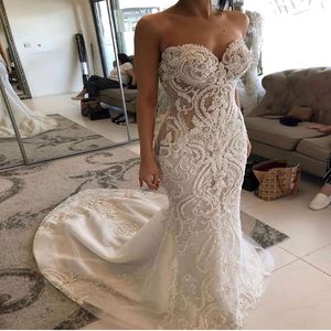 Arabski ASO EBI Luksusowe koronkowe sukienki ślubne z koralikami syrena kochanie sukienki ślubne Vintage Suknie ślubne ZJ296 279Q