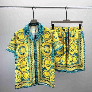 Fashionabla europeiska varumärken Ve Summer Short Sheeved Shirt Set med fram- och baktryckta mönster på beskurna byxor