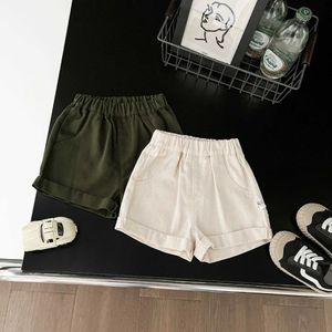 Shorts Summer New Baby Boys Shorts Solid Muslin Elastic Waist Loose Toddler Boys Shorts Versatile Thin Pocket Infant Boys Shorts d240510