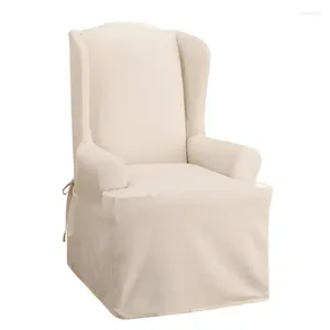 椅子は、伝統的な魅力のために自然のアヒルの翼のスリップカバーをカバーしています