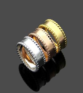 Klasyczny podwójny z rzędu stalowa piłka mężczyzna i kobiety pierścień 18K Rose Gold Flower Par Pierścień świąteczny 9769833