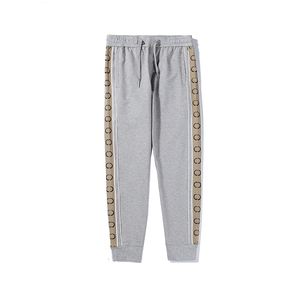 Designer Roupas de moda feminino calça de outono de inverno casual Homens de marca esportes calças de cordas de cordão de arranha -céus