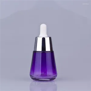 収納ボトル100pcs 30ml紫色のガラスオイル30mlシルバーカバー化粧品パッケージ贅沢1オンスドロッパーエンプ