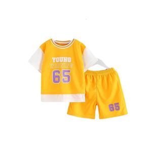 Set per bambini per ragazzi Summer Sports Basketball Uniform ShortSleeved Shorts Shorts Shorts False Twopice Suite Loungwear 240426