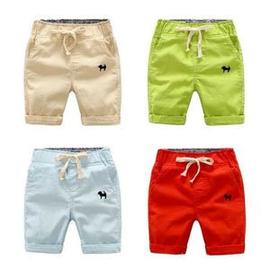 Shorts 2023 Summer Boys Casual Shorts Childrens Cotton Elastic Waist Pants Childrens Knee Pants Solid Color Baby Clothing d240510