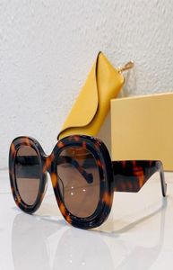 Neue explosive Trend -Sonnenbrille Herren Ladies Luxury Designer Shades Model40103 Outdoor -Fahr Antiuv Miss Sonnenbrille Runde Top Qu4949066