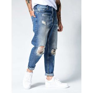 Calças de jeans de jeans com mangas retas e orifícios da moda, jeans azuis finos para homens M511 50