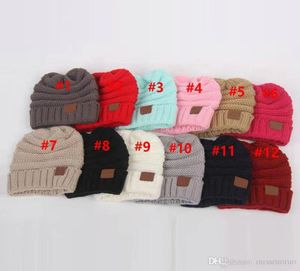 Barn vinter varm hatt stickad hatt etikett barn chunky stretchbara barn stickade mössa baby hatt mössa skully hattar 12 färg dhl3319236