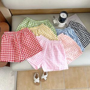 Shorts Korean style 2024 new childrens boys and girls shorts 2-7Y summer unisex anti mosquito childrens casual loose checkered shorts d240510