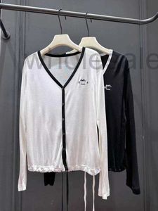 Women's Knits & Tees designer Black and white pre-fall cardigan knitwear NMJC