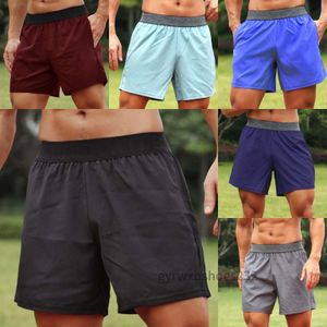 2024 Designer Men Yoga Sports korta snabba torr shorts med bakficka mobiltelefon casual löpande gym jogger pant ll
