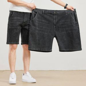 Мужские джинсы летние мужчины плюс джинсовые шорты свободно растягиваются большие размеры высокого размера 54 56