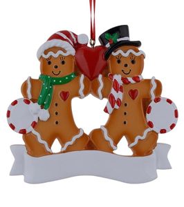 Maxora Resin Gingerbread Family de 2 enfeites de Natal com maçã vermelha como um item de novidade personalizado para presentes para férias e residências de5286067