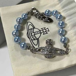 Brand Westwood Classic Saturn Blue Pearl Bracelet for Women with Diamond Planet Versatile and Impossible Handicraft Nail