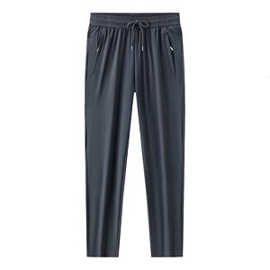 Verão masculino versátil casual 9point calças primavera outono de seda de seda rápida Versão coreana de calças esportivas da moda 240424