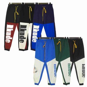 cargo pants mens designer pants vintage joggers sweatpants cargos graffiti print sweatpant jogger pantalon cargo splash ink High Street hip hop Couples