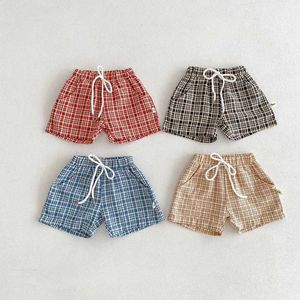 Shorts 2024 Summer Baby Boys Shorts 0-3 Year Old Newborn Girls Elastic Waist Pocket Flat Bottom Korean Style Baby Clothing d240510