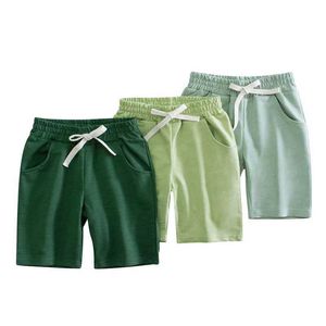 Shorts 2-7T Childrens Shorts Drawstring Solid Boys Girls Summer Trousers Shorts Hot selling Baby Clothing Shorts d240516