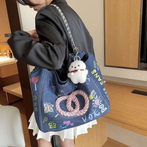 Designer handväska tvättad denim diy kvinnors väska ny trend underarm graffiti broderi canvas axel fabrik marknadsföring