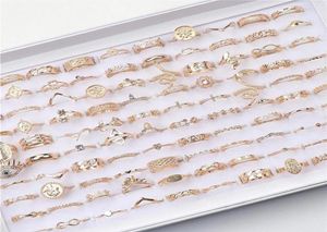 Moda 100pcs partie korona miłość zwierzę zwierząt złoto plisowane palce pierścionki dla kobiet mix w stylu biżuteria ślubna prezenty173e286i3903887