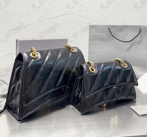 Designer Saco de luxo Brand Leather Hourgass Bolsa Moda Moda Bolsa de cor sólida Para mulheres 2024 Bolsa telefônica leve e simples