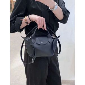 Torba designerska Wysokiej jakości nowa nowa skórzana kieliszki Xtra Mini Dumpling Bag damskie regulowane paski na ramię w stylu torba crossbody torebka torebka na ramię