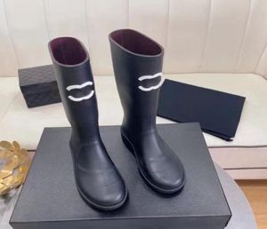 2023 Boot Women Boots Bowts Paris Rain Boots Men Knee High Booties 20mm Arch Arch Eva Rubber Platform Rainboots Green Brig8312342