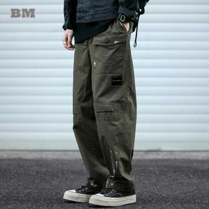 Spodnie męskie wiosna i jesienne koreańskie malarstwo modowe Spotki Spotki HARAJUKU Męskie Casual Bag Pants Outdoor Street Clothing Spodersl2405