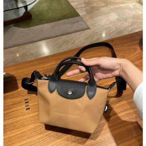 Designer Bag Mini New High Quality Double Handle Dumpling Bag Womens Nylon Cloth with Cowhide Casual Crossbody Bag Youth One Shoulder Handbag