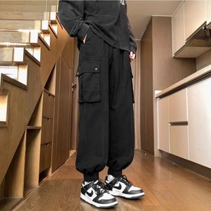 Men's Pants Fashionable oversized jogger mens cotton elastic waist pocket long tapered mens work clothes casual cargo pants blackL2405