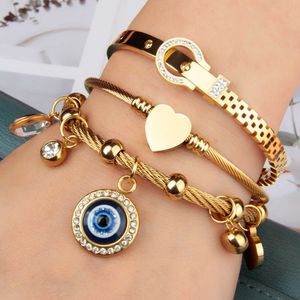 Höga smycken armband och armband överdrivna flerstil hängande små nycklar blå ögon rostfritt stål guldarmband