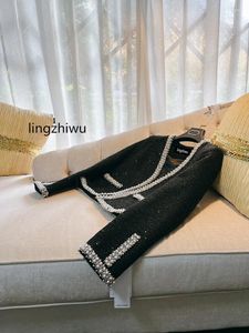 Женские куртки Lingzhiwu Ladies Overwear Designer уникальный красивый черный топ черный топ Элегантный качественный пальто