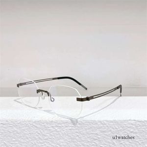 Optiska glasögon för män Kvinnor 2423 Retro Style Anti-Blue Oval Frameless Glass med låda