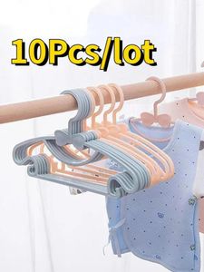 Cabides 10pcs Rack de roupas infantis Crianças exibem roupas portáteis cabide bebê racks à prova de vento Plástico Organizador de plástico armazenamento doméstico