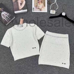 Two Piece Dress designer 2024 New M Home Heavy Industry Nail Bead Round Neck Short sleeved Knitted Shirt for Women+High Waist Elastic Wrapped Hip Skirt Set Women SOEU