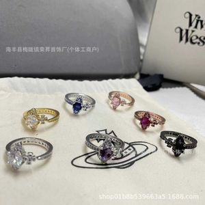 Designer High Version Westwoods Feeling and Temperament White Stone Ring med Diamond Opening Justerbar Saturn Nail