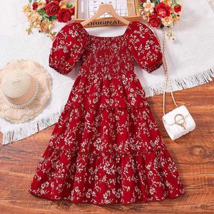 Mädchenkleider Kinder Casual Womens Clothing 2024 Neuer Sommer Qilun Mode rotes Blumendruck kurzärmeliges Prinzessin Kleid 7-14yl240513